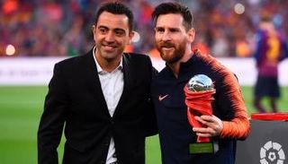 تشافي هيرنانديز وليونيل ميسي