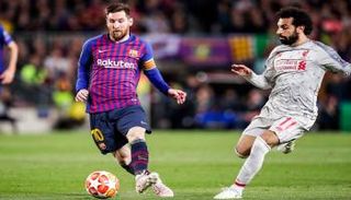 محمد صلاح مع ليونيل ميسي