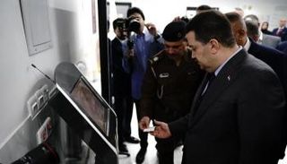 السوداني خلال افتتاح نافذ الجواز الالكتروني