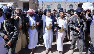 محمد علي الحوثي لدى تحكيمه في إحدى القضايا