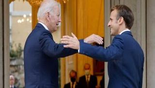 الرئيسان الأمريكي والفرنسي خلال لقاء سابق