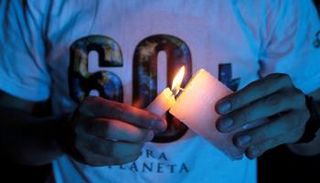 ساعة الأرض جرس إنذار لإنقاذ كوكب الأرض