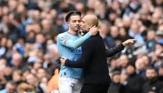 بيب غوارديولا وجاك غريليش