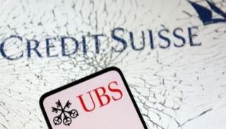 استحواذ يو بي إس على كريدي سويس