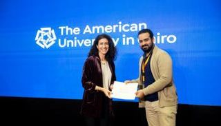 مهند أبوالروس في إحدى الفعاليات بالجامعة الأمريكية بالقاهرة