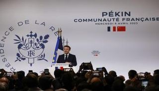 الرئيس إيمانويل ماكرون يتحدث خلال لقاء مع الجالية الفرنسية في الصين 