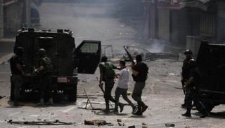 جانب من المواجهات الفلسطينية الإسرائيلية والاعتقالات