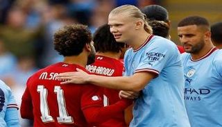 محمد صلاح وإيرلينج هالاند