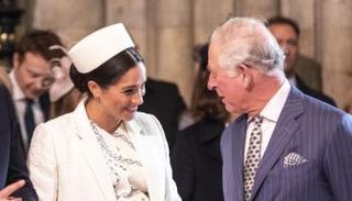 ميغان مع الملك تشارلز، الذي كان في عام 2019 أمير ويلز