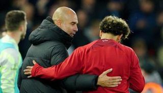 بيب غوارديولا ومحمد صلاح