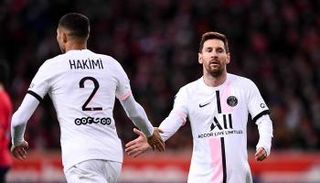 ليونيل ميسي وأشرف حكيمي