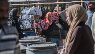 سودانيات فارات من جحيم المعارك- أرشيفية