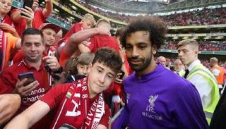 محمد صلاح ومشجع ليفربول