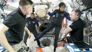 ريانة والقرني خلال مهمتهما بمحطة الفضاء الدولية 