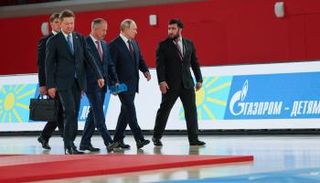 الرئيس الروسي فلاديمير بوتين مع قادة رياضته المفضلة الجودو