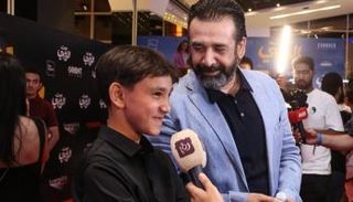 كريم عبدالعزيز وابنه علي