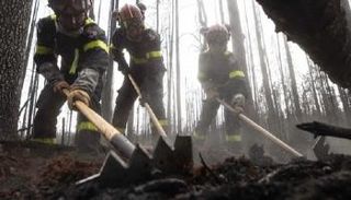 عمال المناجم في منطقة الحرائق بكندا