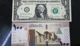 الجنيه السوداني والدولار الأمريكي- أرشيفية