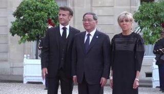 رئيس مجلس الدولة الصيني، لي تشيانغ والرئيس الفرنسي