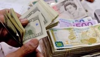 فئات ليرة سورية ودولار أمريكي - أرشيفية 
