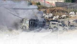 جانب من الاشتباكات بين الفلسطينيين والقوات الإسرائيلية