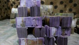 سعر الدولار اليوم في سوريا- أرشيفية 