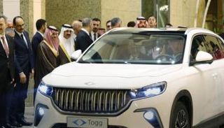 erdogan-mohammed-bin-salman-car-tug