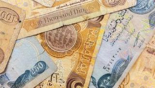 كميات من العملة العراقية من فئات 1000 و 250 دينار - أرشيفية