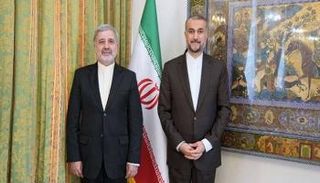 علي رضا عنايتي، سفير إيران في السعودية خلال لقائه وزير الخارجية أمير عبد اللهيان