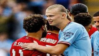 محمد صلاح وإيرلينغ هالاند