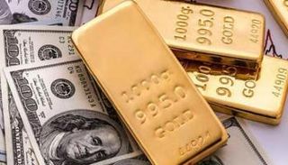 سبائك ذهبية ودولارات