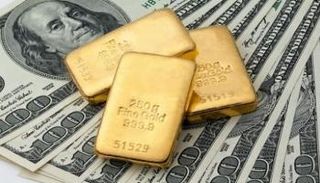 سبائك ذهبية ودولارات