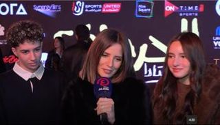 إيمان العاصي رفقة ولديها