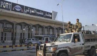 مسلحون في محيط مطار حلب الدولي