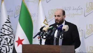 محمد البشير رئيس الحكومة الانتقالية في سوريا