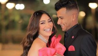 عصام صاصا وزوجته