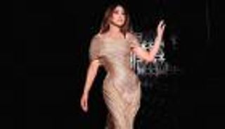 نجوى كرم بإطلالة ذهبية في أحدث حفلاتها (صور)