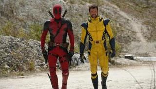 هيو جاكمان وريان رينولدز 