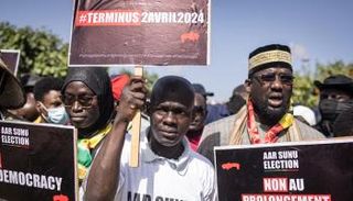 مظاهرة معارضة لتأجيل الانتخابات بالسنغال - أ.ف.ب