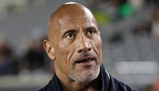 ما هو تاريخ ذا روك في ريسلمانيا؟