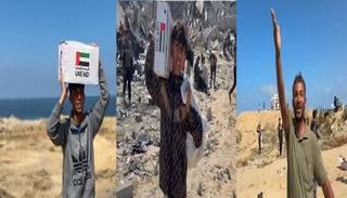 فلسطينيون يحملون المساعدات في غزة