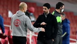 بيب غوارديولا ومايكل أرتيتا