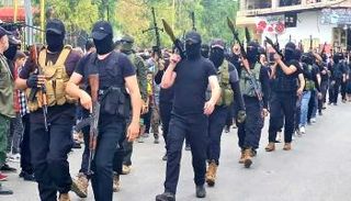 استعراض مسلح لجماعة الإخوان في لبنان