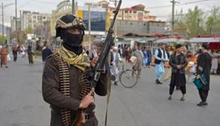 أحد عناصر الأمن الأفغاني