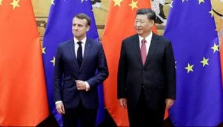 الرئيس الصيني مع ماكرون في لقاء سابق