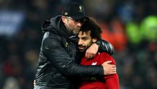 محمد صلاح ويورغن كلوب