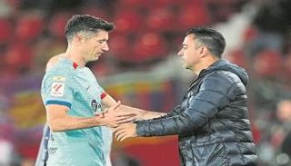 تشافي وروبرت ليفاندوفسكي