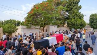 صور من تشييع جثمان الجندي المصري