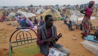 نازحون سودانيون جراء الحرب - رويترز