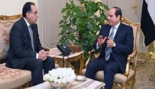 السيسي ومدبولي في لقاء سابق